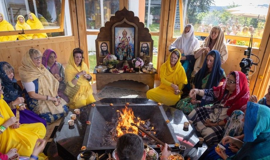 Group yajna fire ceremony indoors